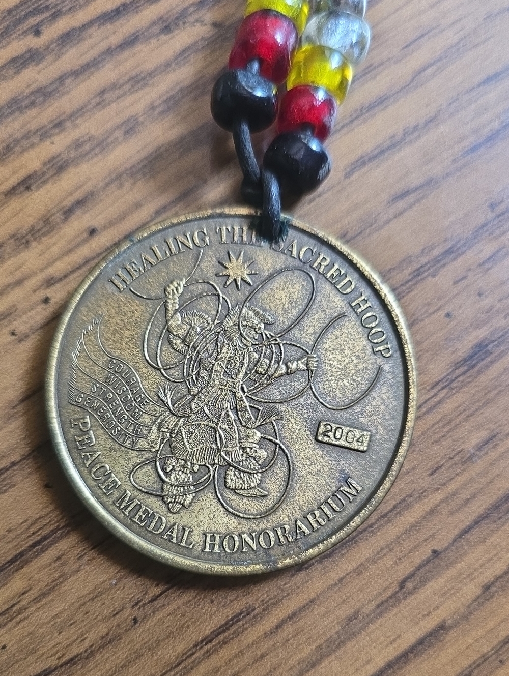 Antique bronze "Healing The Sacred Hoop" peace medal